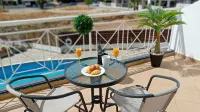Kato Paphos Suites -Studio Apartment with Pool view, Wi-Fi & a/c. Great Location