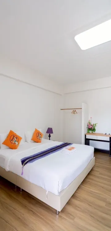 ห้องมาตรฐานเตียงควีนไซส์ (เตียงเดี่ยว 5 ฟุต) 