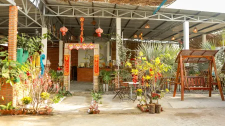 Kiwi's Homestay & Cafe Отели рядом с достопримечательностью «Fairy Stream»