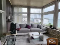 Modern Eingerichtete Ferienwohnung mit Faszinierendem Meerblick!