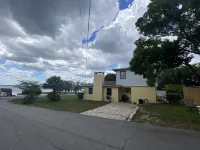 Watch Florida sunsets from the covered lakefront dock Hotels in Minneola