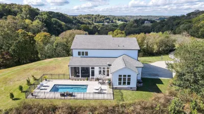 Gated Private Estate With Pool, Hilltop Views, and Game Room on 8 acres