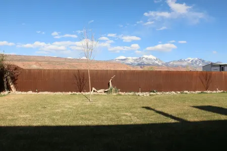 Quiet neighborhood home with mountain and red rock views