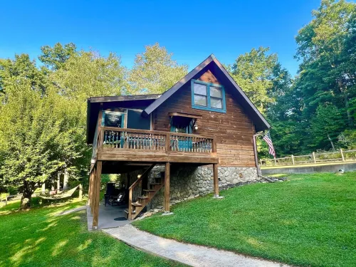 Enjoy a Cabin Including Blueberry Picking, Yard Games, Fire Pit, Screened Porch.