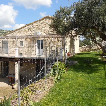 Secluded old farmhouse with a view and pool to relax in total quiet.