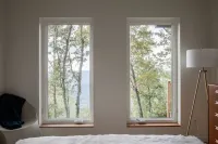 Two Bedroom Modern Tiny House with Bluff Views, Huge Windows!