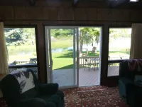 Dad's Paradise on Pigeon Cove offers WaterFront Sunrise Views and Lake Access!
