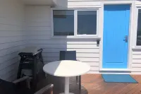 Beach House with Bay of Fires views, featuring 2 bedrooms with ensuite bathrooms