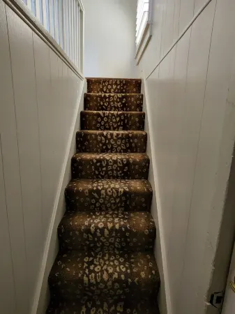 Garage apartment central to all activities.