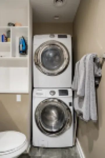 Two-story condo in luxury townhouse. Free parking.