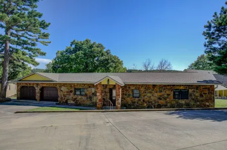 Waterfront Home with private boat ramp and boat dock.