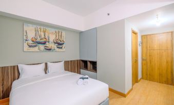 Comfortable Pool View Studio Room at Gateway Park LRT City Bekasi Apartment