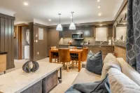 Covered Porch and Modern Amenities - Charming Cozy Escape