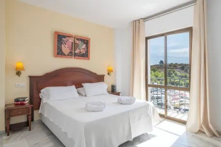 Apartamentos Playamaro