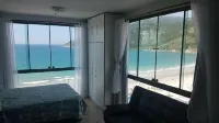 Loft na Orla da Prainha - خدمة نقل من وإلى المطار