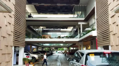 Cozy Place at Bamboo Bay Cebu Отели рядом с достопримечательностью «Себу Докторс Юниверсити»