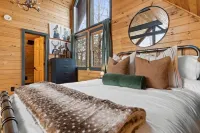 Escape to our luxe, pet-friendly Blue Ridge cabin—sleeps 14 with top amenities!