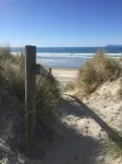 Lovely sunny home with beach views to the front and county views at the back.