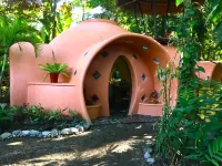 Adobe-style Dome Home with a pool In A Lush garden minutes from the beach.