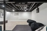 Updated Lansing Home | 4BR w Basement Theater Room