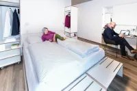 Motel Schlafraum Schlüßlberg-Dein Smartes Hotel-Contactless Check-IN Hotel a 