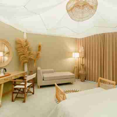 Asha Beach Club & Resort Rooms