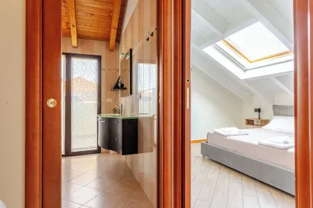 [Cotton Flower] Penthouse 15 minutes from Malpensa MXP Отели рядом с достопримечательностью «Stazione Busto Arsizio»