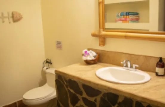 Private suite 103 with beautiful gardens, shared pool and BBQ area!