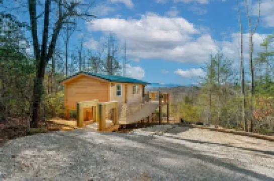 Romantic Treehouse with Hot Tub, Waterfall, Hiking, Swinging Bridge & Goats