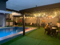 Tiano Hotel & Suites - Kolam Renang