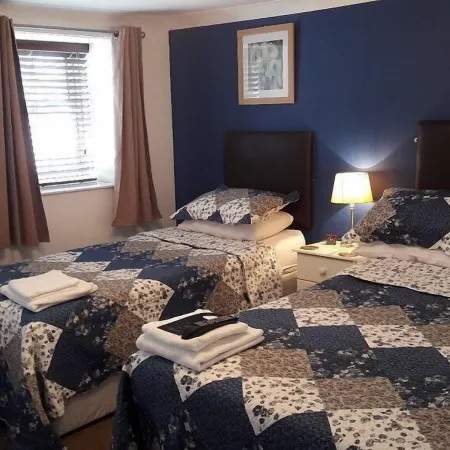 Bed and Blueberry Two Bed Suite for 2,3, 4 People Own Facilities
