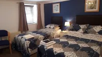 Bed and Blueberry Two Bed Suite for 2,3, 4 People Own Facilities - 4-Star