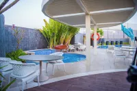 Grand Millennium Muscat Apartments and Suites connected to Mall - Rooftop Pools
