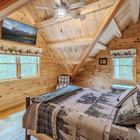 Luxury Log home steps from private beach in Meredith on Lake Winnipesaukee.