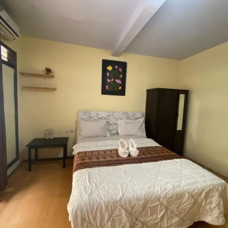 Adel Guest House Hoteles en Sukun