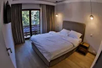 Expecto Apartments Отели в г. 