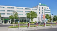 Holiday Inn Berlin Airport - Conf Centre Hotels near REWE