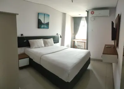 Izi Cozi Jababeka Enviro Powered by Archipelago Hotels near MASJID Baitul Manshurin (LDII)