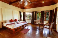 Triveny River Palace Hotels near Mannarasala Sree Nagaraja Temple