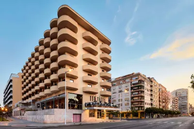 NH Luz Huelva Hotels near Primark