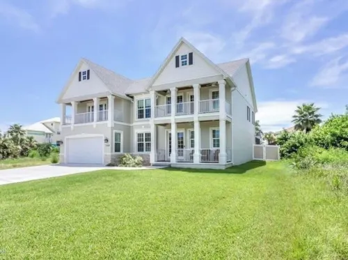 Beautiful two-story single family beach home with a private pool and ocean views