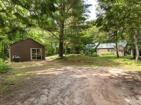 Direct Betsie River frontage.