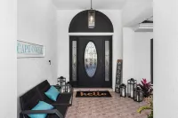 PARADISE COVE- Spacious Canal Home with htd saltwater Pool! Sleeps 13!