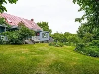 Hill top home located on 30 acres with privacy and surrounding natural beauty.