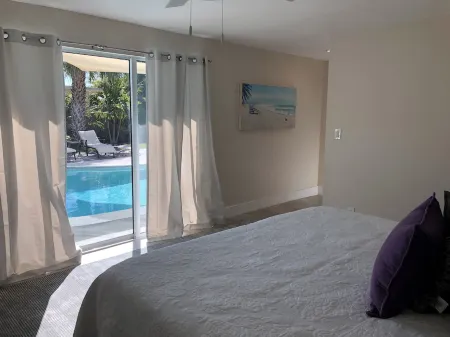 Private Vacation Home w/ Heated Pool. Walk/Bike to Vanderbilt Beach & Amenities.