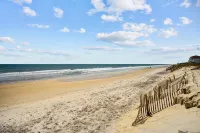 Heated Pool / Beachfront / Private Hot Tub / Elevator / Linens Included