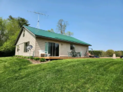 Peacefully secluded cabin on a small private lake with 55 Acres