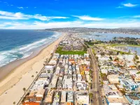 Chic 2BR Retreat - Steps to Beach, Exclusive Patio, Garage Parking