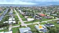 Endless summer paradise at Sunnybelle..YACHT CLUB beach neighborhood!
