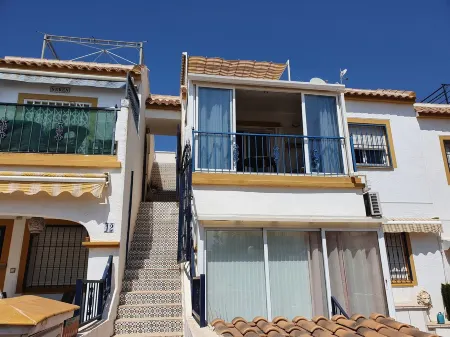 2 bedrooms, beautiful pool area, tennis court, near the beach, quiet location